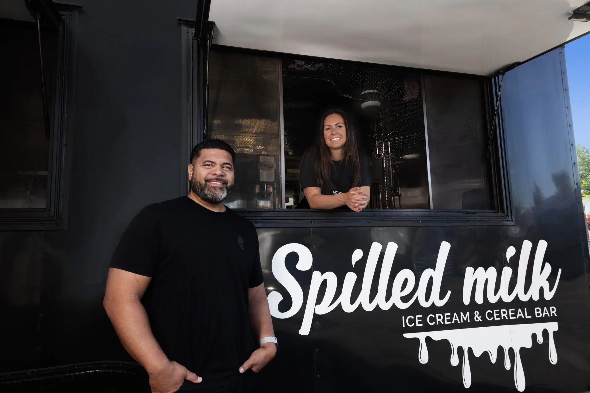 A Photo of Owners Marv and Sarah with the Spilled Milk truck