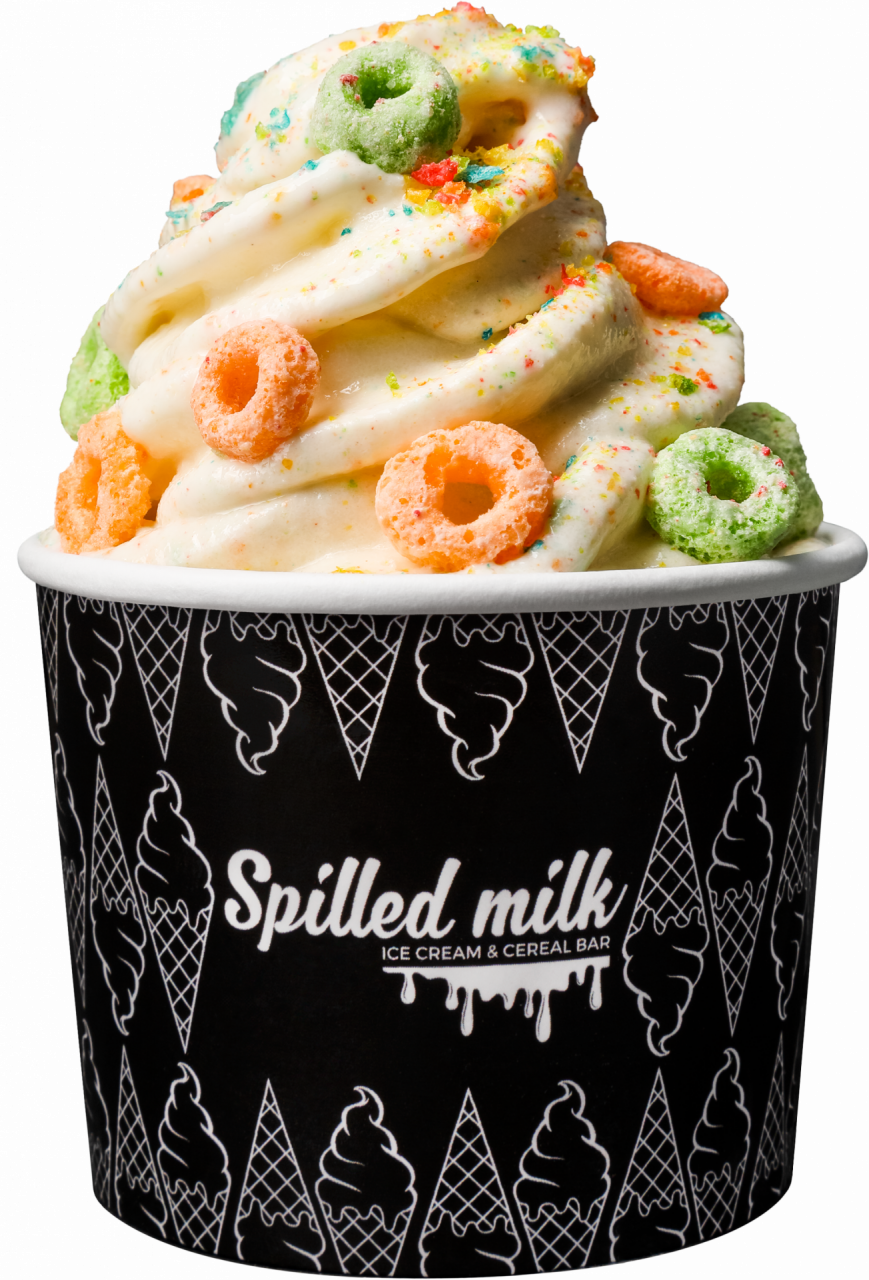 A spilled milk ice cream cup with fruit loop toppings